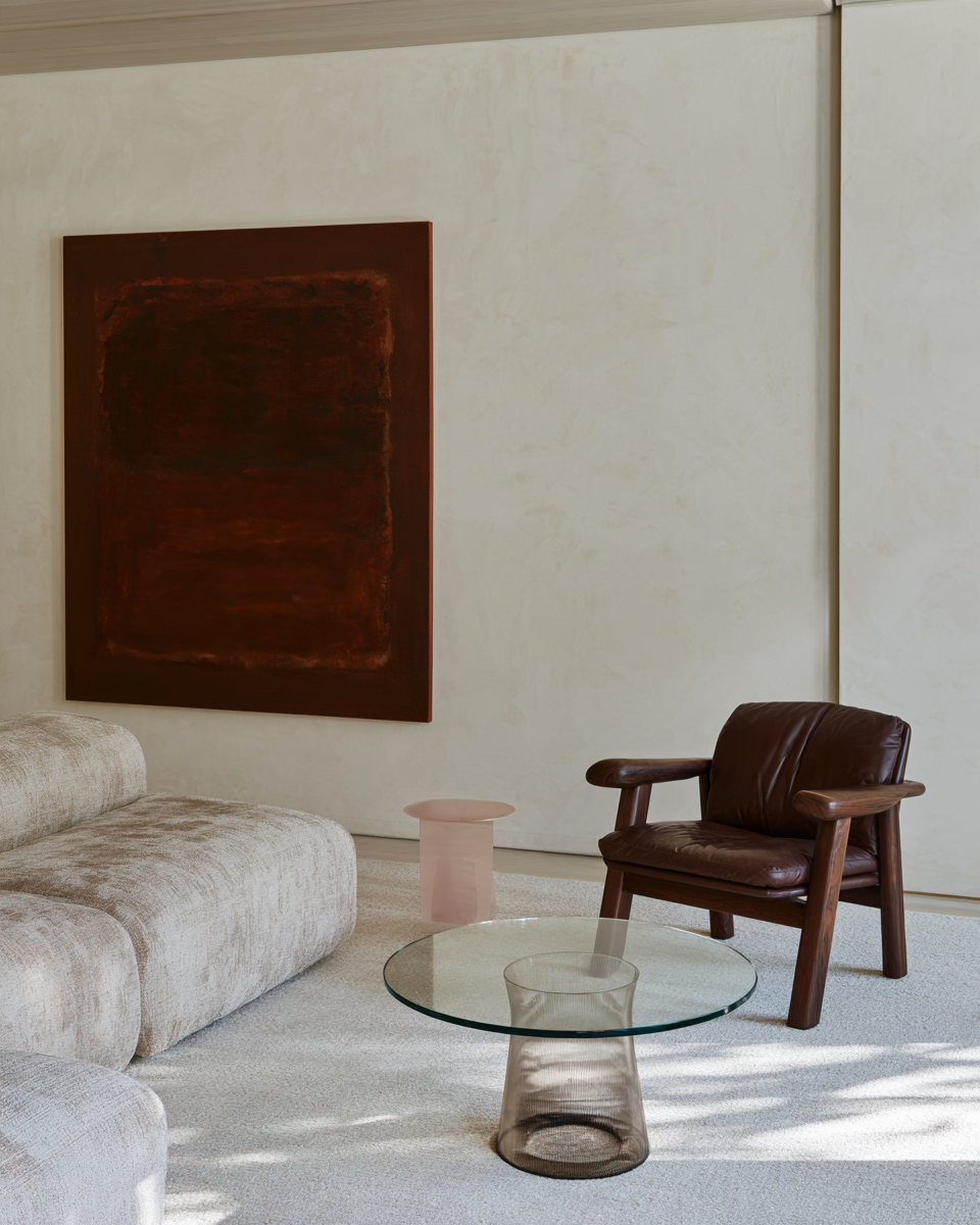 Umbre, a textured abstract painting in deep burgundy, rust red and burnt sienna, featuring a dark central composition with irregular layered edges.